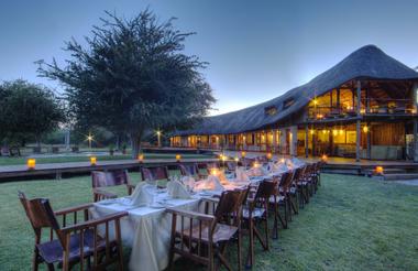 Lounge and dining area, with its inviting wooden and thatch finish